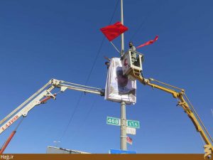 نصب تصاویر شهدای مدافع حرم در مسیر نجف تا کربلا